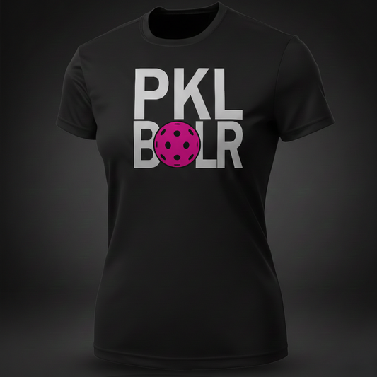 Black t-shirt with 'PKL BOLR' text and pink pickleball ball graphic on a dark background