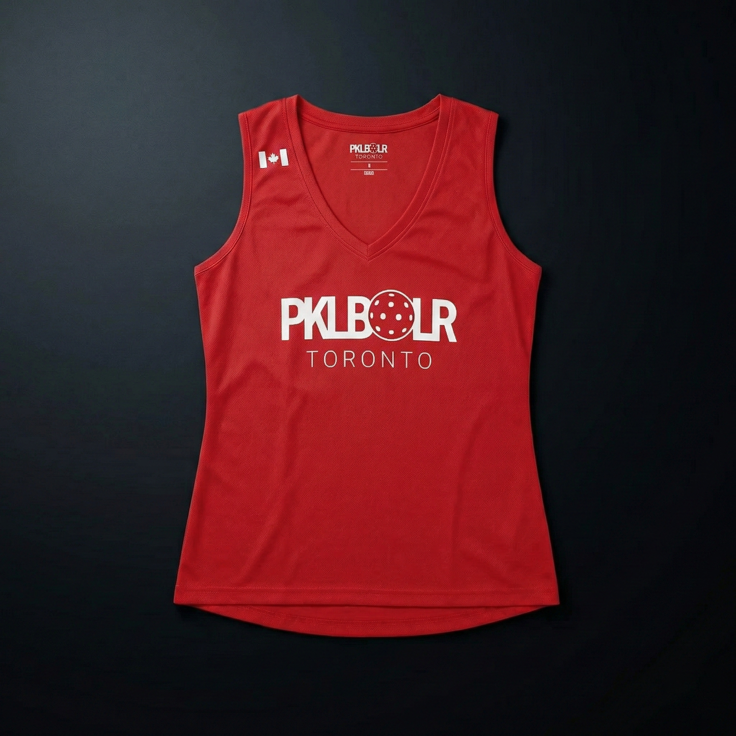 Red sleeveless shirt with 'PKL BOLR Toronto' text on a black background